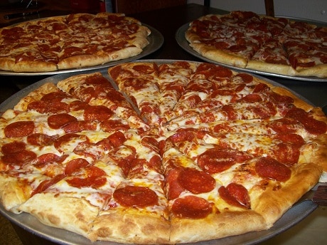 Three pepperoni pizzas.
