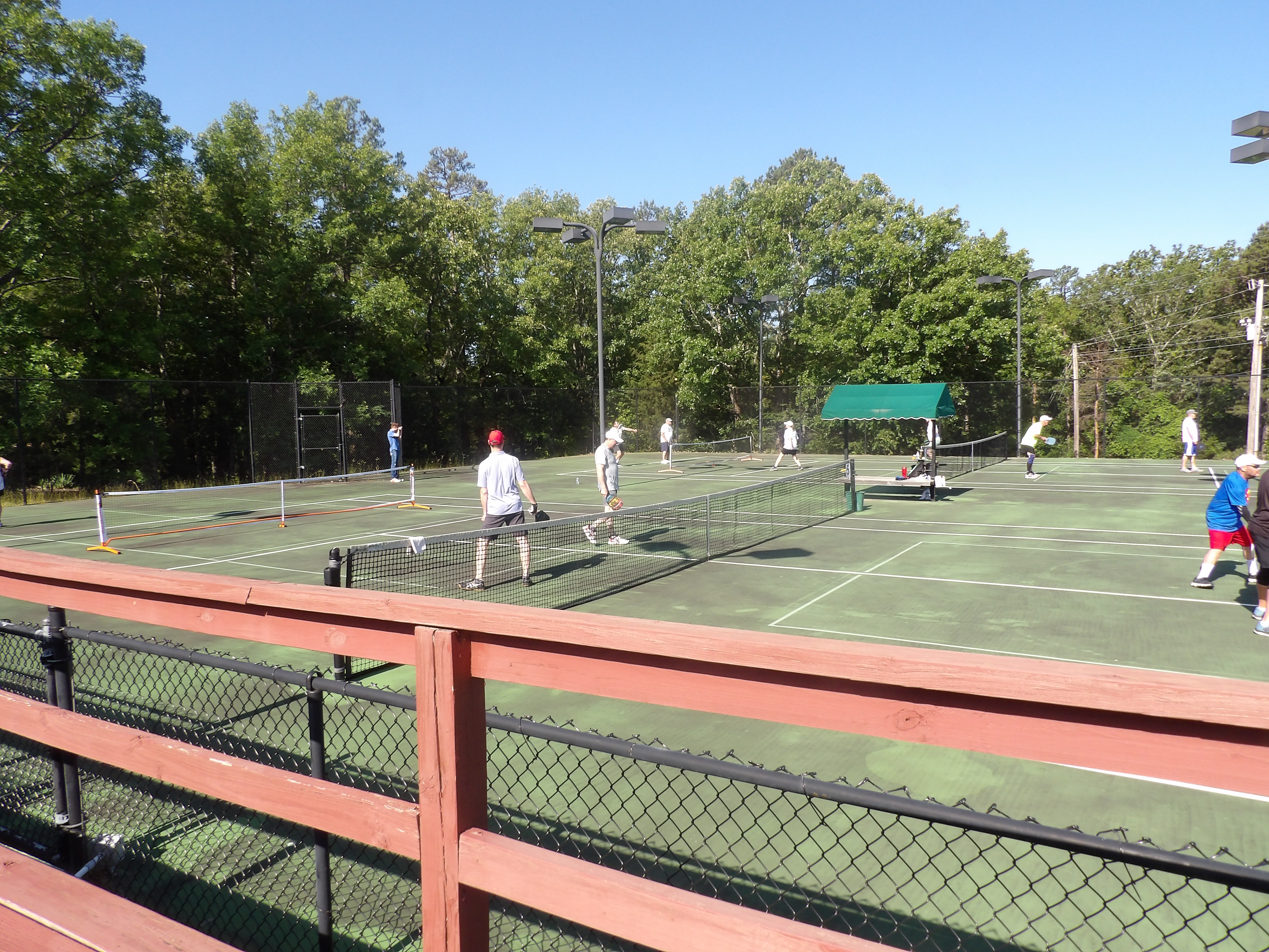 People playing Pickleball on the Pickleball courts in Fairfield Bay, AR.